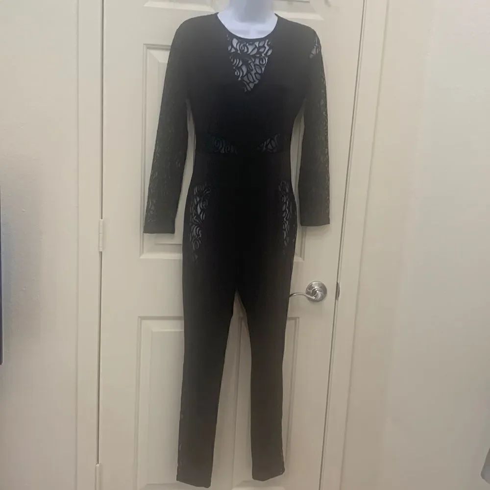 Black Lace Size Medium 88% Polyester 12% Spandex Long Sleeve Zip Back Jumpsuit